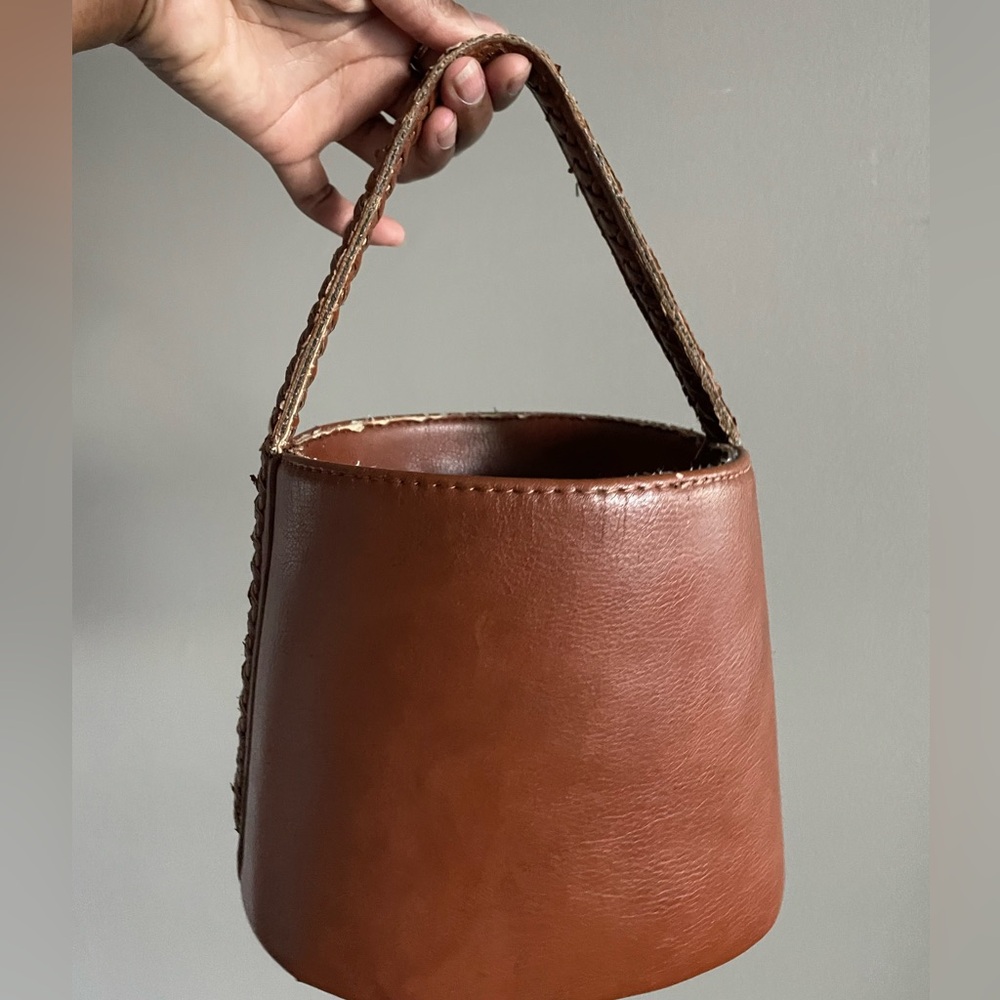 Extremely worn but extremely cute Free People bucket bag.